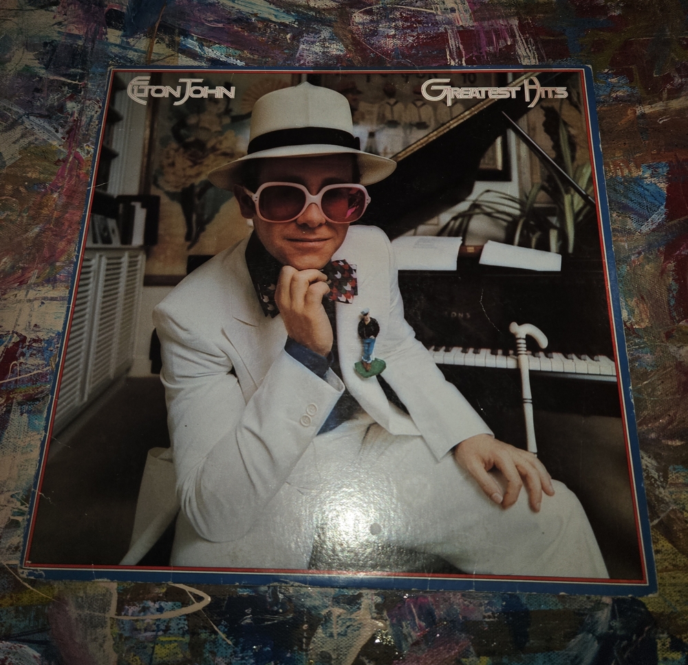 Elton John - Greatest Hits (Album Cover) in White Suit